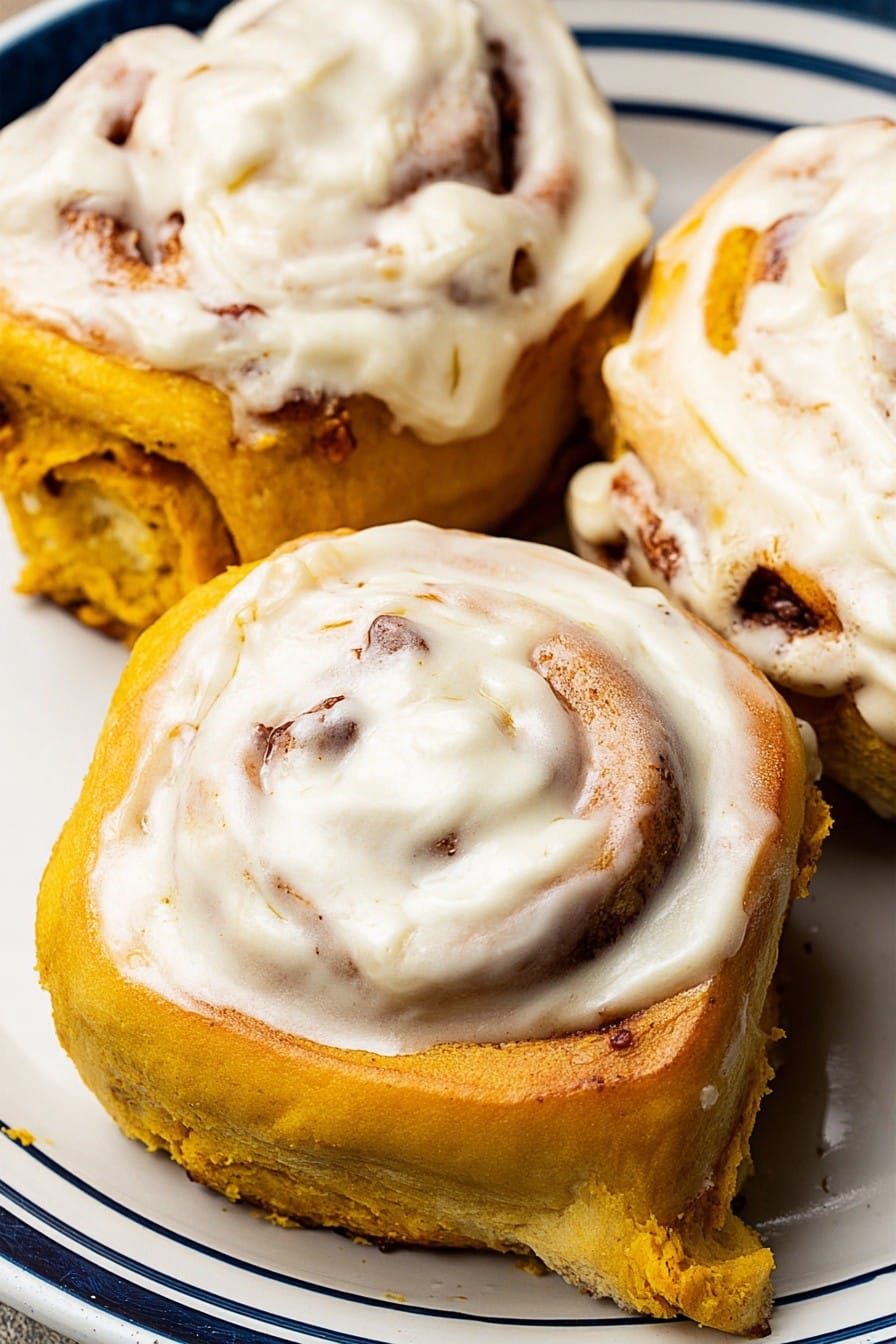 A delicious, irresistible picture of Pumpkin Greek Yogurt Cinnamon Rolls